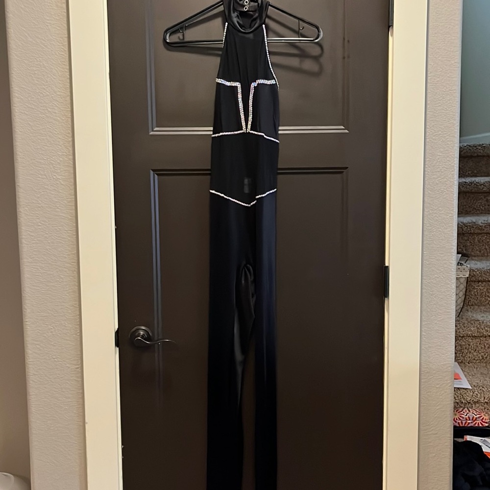 Black sheer paneled dance bodysuit.